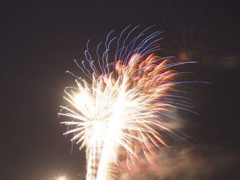 Firework display at night