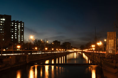 Bridge over river at night