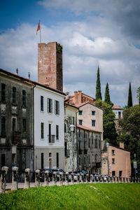 Buildings in city against sky