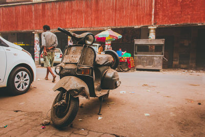 Rear view of people working on road