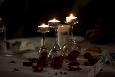 Close-up of wine glasses on table