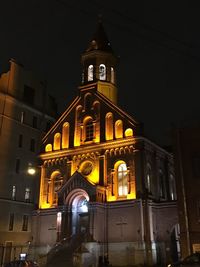 Facade of church at night