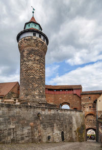 Low angle view of historic building against sky