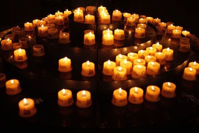 High angle view of illuminated candles