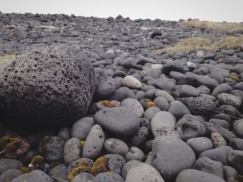 Rocky field against sky