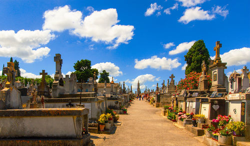 Old cemetery  and marble tombstones for the graves in sunny day near the carcassonne castle. 