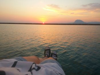 Scenic view of sea at sunset