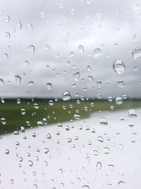 Close-up of water drops on glass