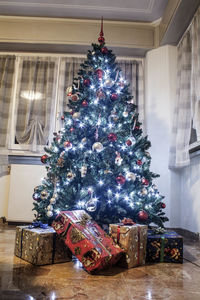 Illuminated christmas tree at home