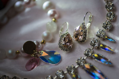 Silver ,pearl and gold jewelry on the table. background of jewelry.