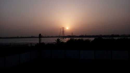 Scenic view of sunset over river