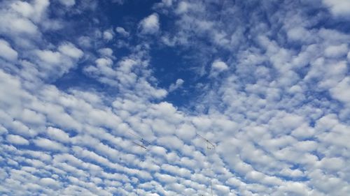 Low angle view of clouds in blue sky