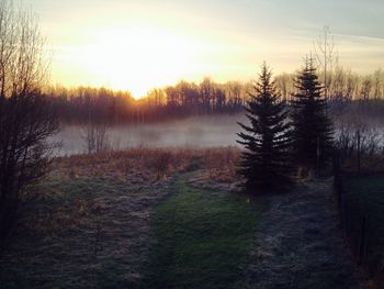 Scenic view of landscape at sunset