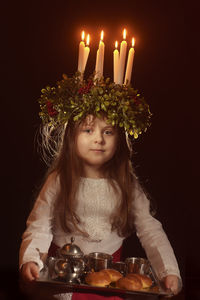 Portrait of girl with arms outstretched