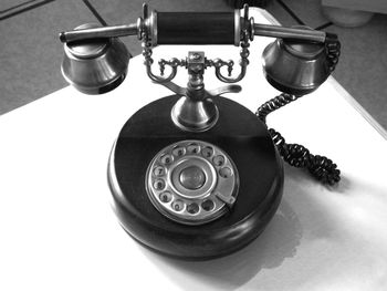 High angle view of telephone on table