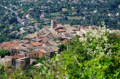 High angle view of townscape and trees in town