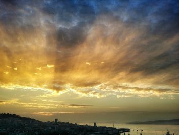 Scenic view of sea against sky at sunset