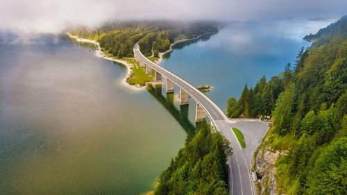Panoramic view of bridge over road against sky