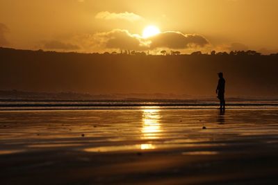 Scenic view of sunset over sea