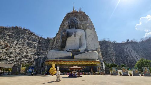 Statue of temple against building