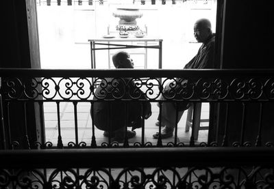 Monks looking away in temple