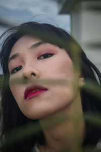 Close-up portrait of a beautiful young woman