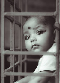 Portrait of cute boy looking away