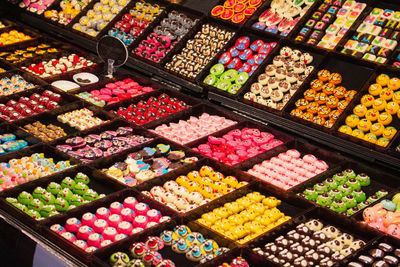 High angle view of multi colored candies for sale