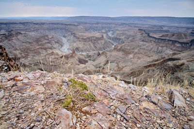 Scenic view of rocky mountains against sky