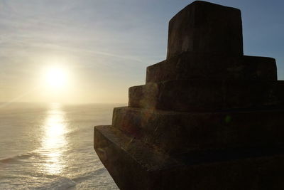 Sun shining over sea