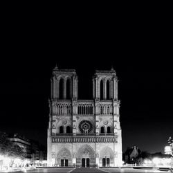 Low angle view of illuminated building at night