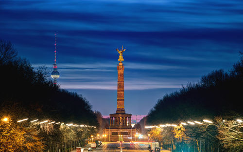 Low angle view of illuminated statue at night