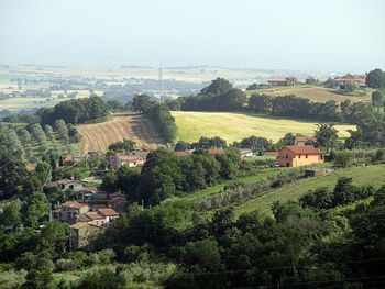 Aerial view of agricultural landscape against sky