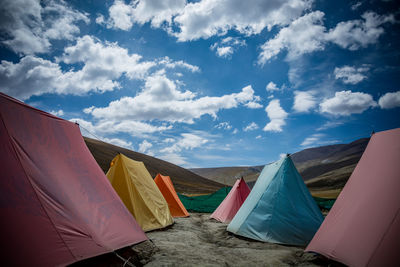 Clothes drying on clothesline against sky