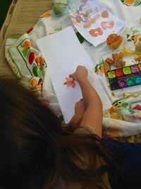 Close-up of woman painting