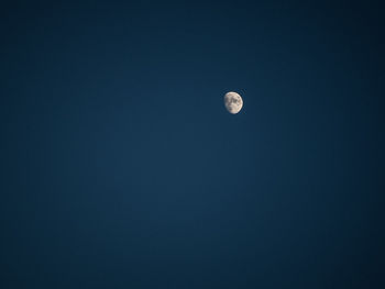 Low angle view of moon in sky