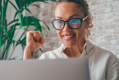 Smiling businesswoman talking on video call