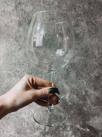 Close-up of woman hand holding glass