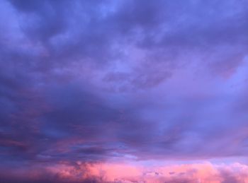 Low angle view of cloudy sky during sunset