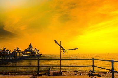 Scenic view of sea against sky during sunset