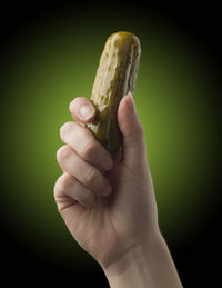 Close-up of hand holding ice cream