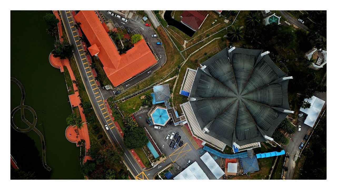 HIGH ANGLE VIEW OF BUILDINGS AND TREES IN CITY