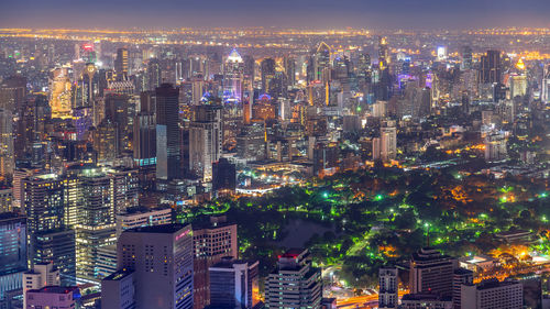 Aerial view of illuminated cityscape at night