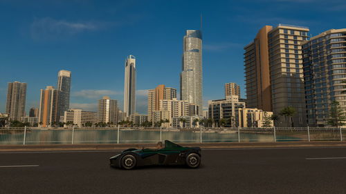 View of modern buildings against sky in city