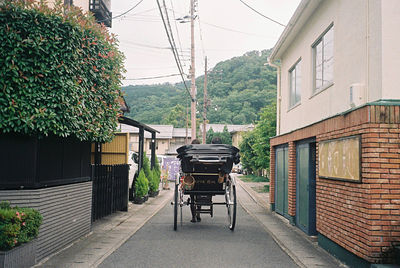 View of alley amidst buildings