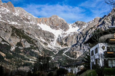 Scenic view of snowcapped mountains against sky