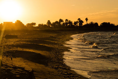 View of beach during sunset