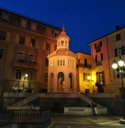 Exterior of old town against sky at night