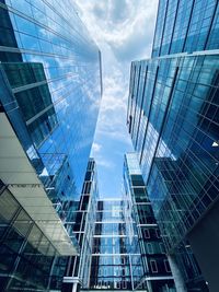 Low angle view of modern buildings against sky