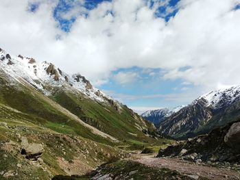 Scenic view of snowcapped mountains against sky